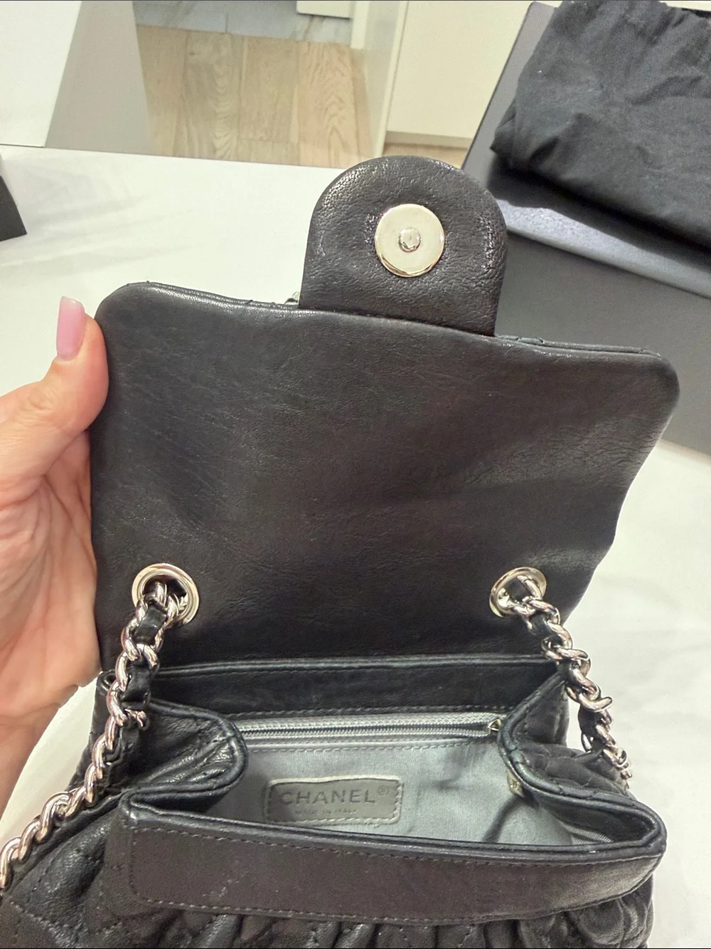 CHANEL Black Quilted leather chain around Crossbody with Silver CC Chain
